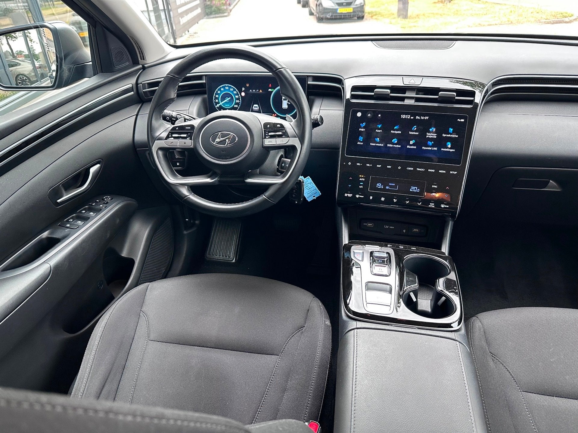 Hyundai TUCSON 1.6 T-GDI PHEV 265pk 4WD ADAPT. CRUISE / CAME, Auto's, Automaat, Stof, Gebruikt, 4 cilinders