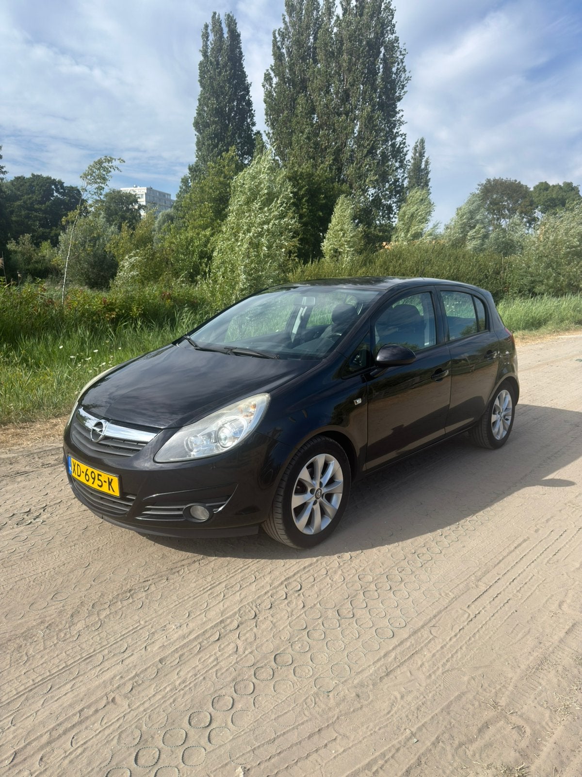 Opel Corsa 1.2 16V 5D 2009 Zwart, Auto's, Voorwielaandrijving, 4 cilinders, 1229 cc, Handgeschakeld