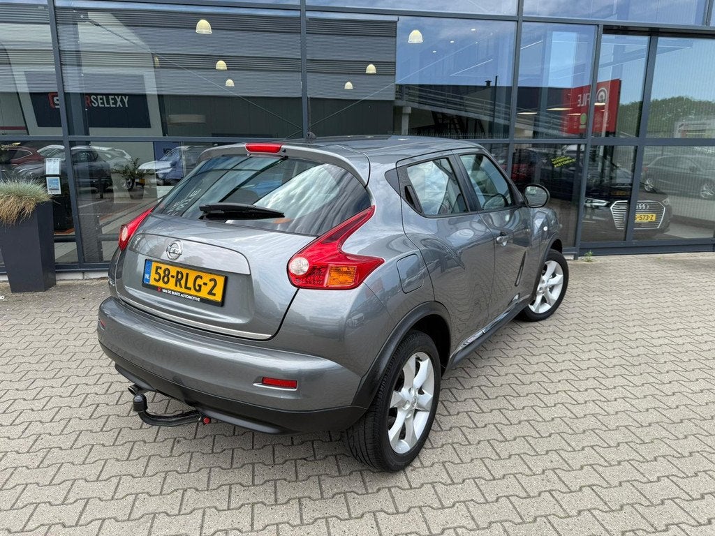 Nissan Juke 1.6 Acenta *Trekhaak & Cruise Control*, Auto's, Nissan, Euro 5, Stof, 4 cilinders, 49 €/maand