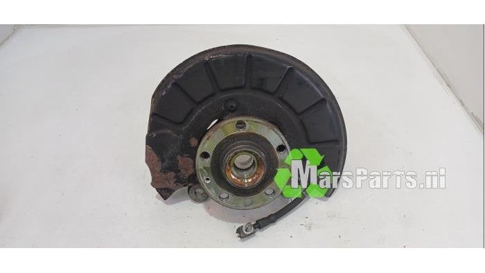 Fusee rechts-voor van een Volkswagen Caddy