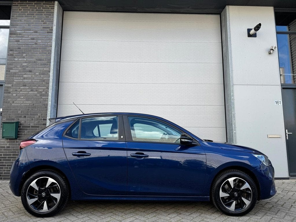 Opel Corsa-e Edition 50 kWh [92% SoH | Carplay | Cruise | PD, 330 km, Gebruikt, Zwart, Blauw