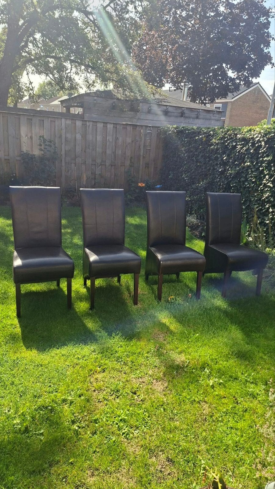 Set van 4 bruine leren eetkamerstoelen, Ophalen, Gebruikt, Kunststof, Bruin