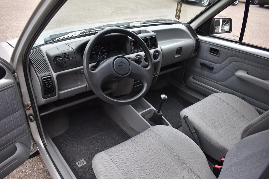Opel Corsa 1.2i City 120dkm NLauto Weinig eigenaren, Auto's, Gebruikt, 4 cilinders, Handgeschakeld, Grijs