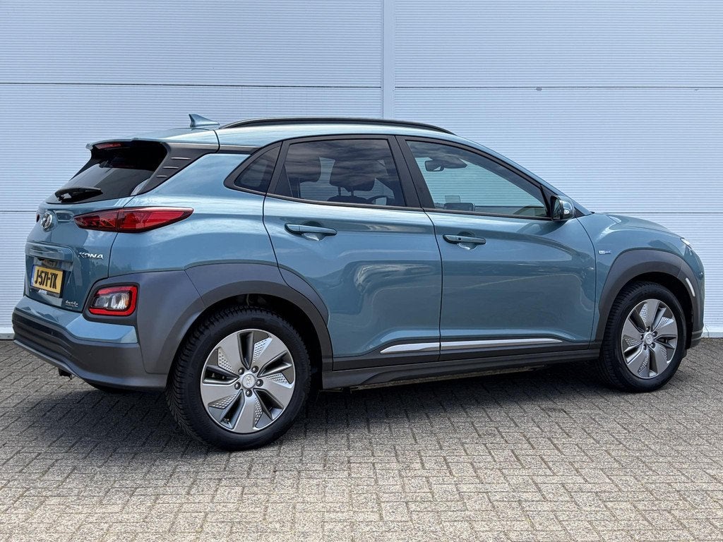 Hyundai Kona EV Premium 64 kWh SOH 100 % 1 Fase / Lichtmetal, Auto's, Hyundai, Adaptive Cruise Control, Gebruikt, Blauw, 64 kWh