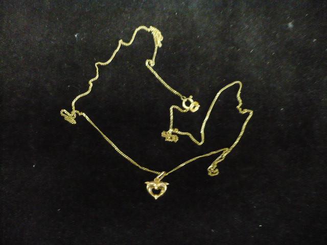14 krt. gouden ketting met hanger hartje 2.4 gram lengte 52, Met hanger, Gebruikt, Ophalen of Verzenden, Goud