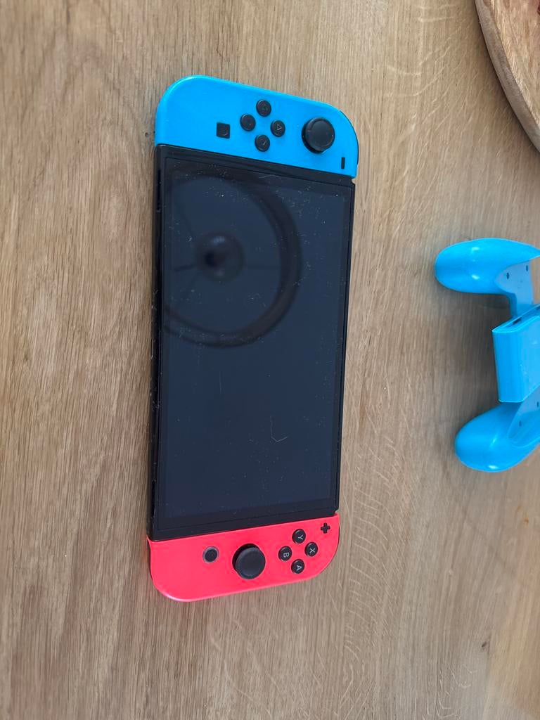 Nintendo switch oled met hoes een twee spellen, Spelcomputers en Games, Spelcomputers | Nintendo Switch, Ophalen of Verzenden
