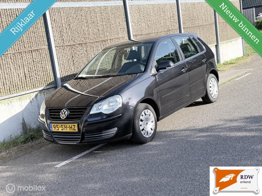 Volkswagen Polo 1.4-16V Comfortline NAP/AIRCO/NETTE AUTO/RUI, Auto's, Voorwielaandrijving, Zwart, Origineel Nederlands, Handgeschakeld