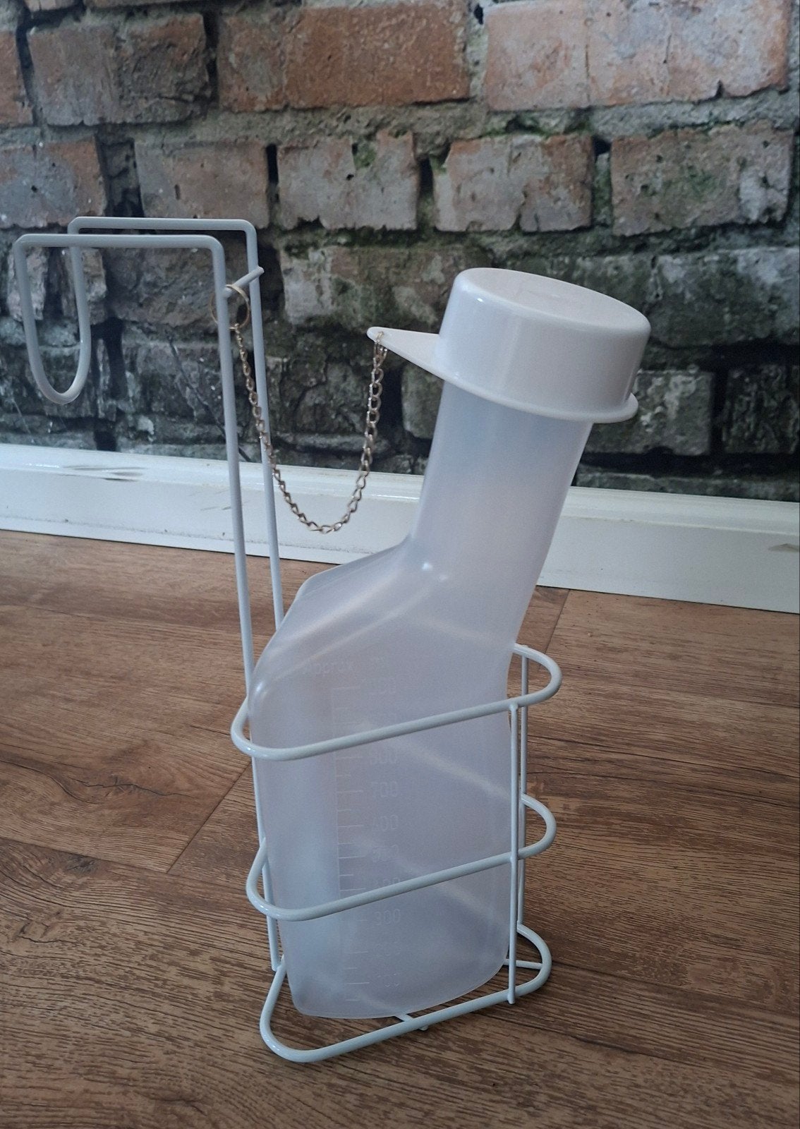 Nieuwe kunststof urinaal fles voor man +houder en ophanghaak, Ophalen of Verzenden