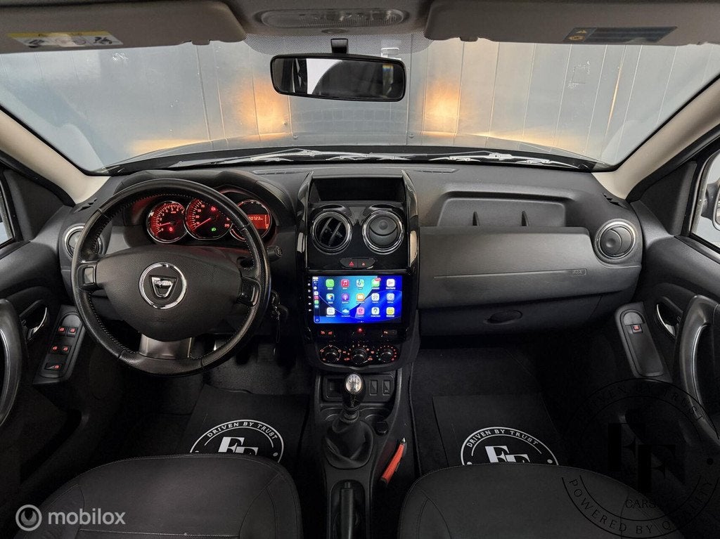 Dacia Duster 1.2 TCe Lauréate|NAP|CarPlay|Cruise|Leder, Auto's, Dacia, Voorwielaandrijving, Euro 5, 125 pk, Gebruikt