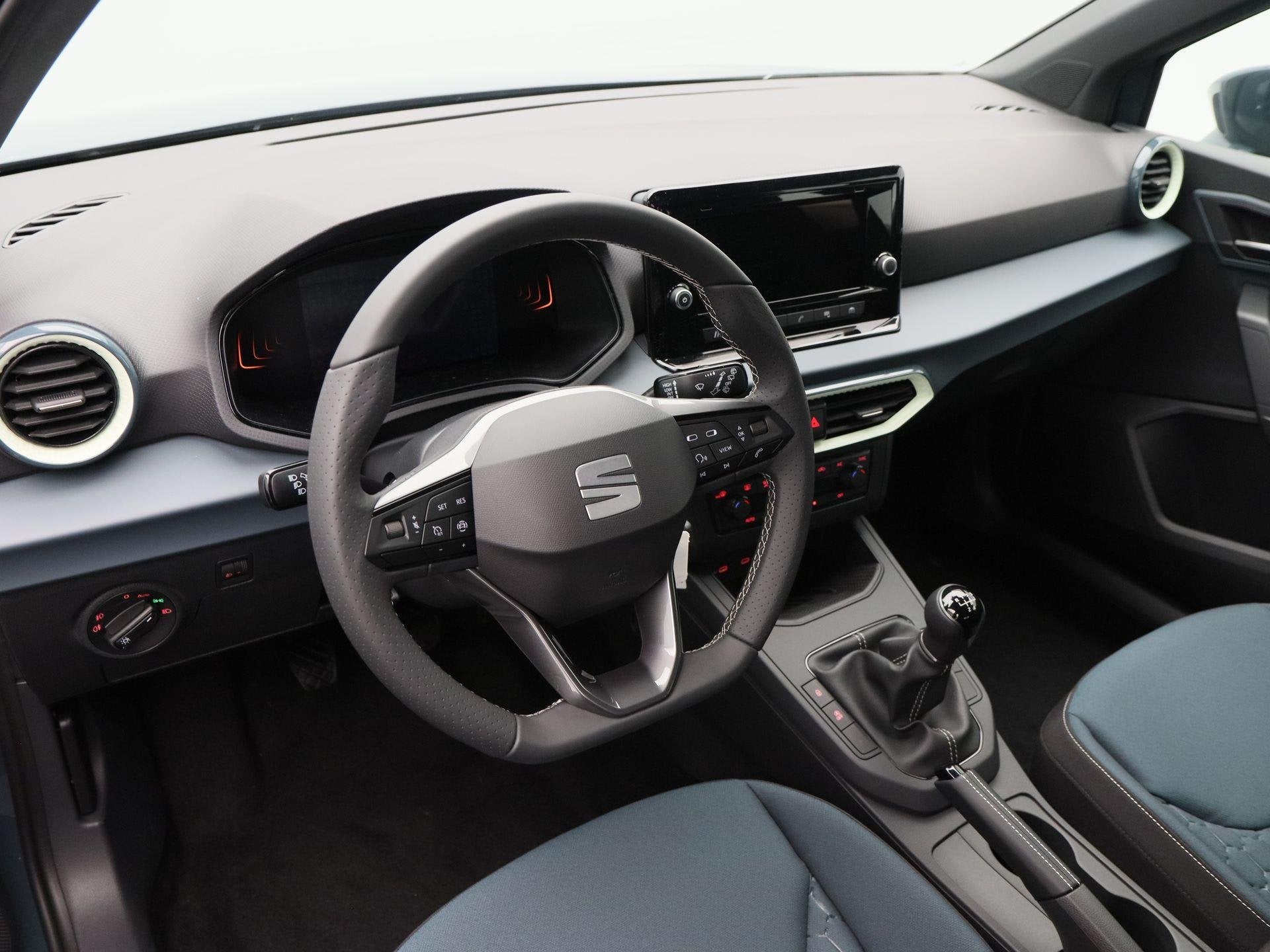 SEAT Arona Style 1.0 TSI 95 PK | Parkeersensoren | Cruise co, Auto's, Voorwielaandrijving, Stof, 95 pk, Blauw