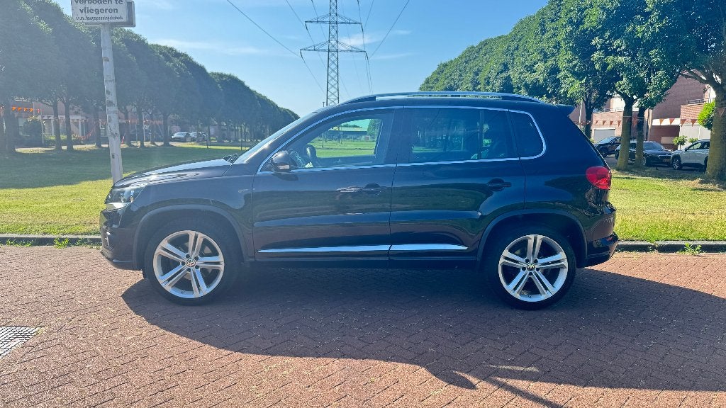 Volkswagen Tiguan 1.4 TSI R-Line Edition 90kW, Voorwielaandrijving, Multifunctioneel stuurwiel, 15 km/l, Zwart
