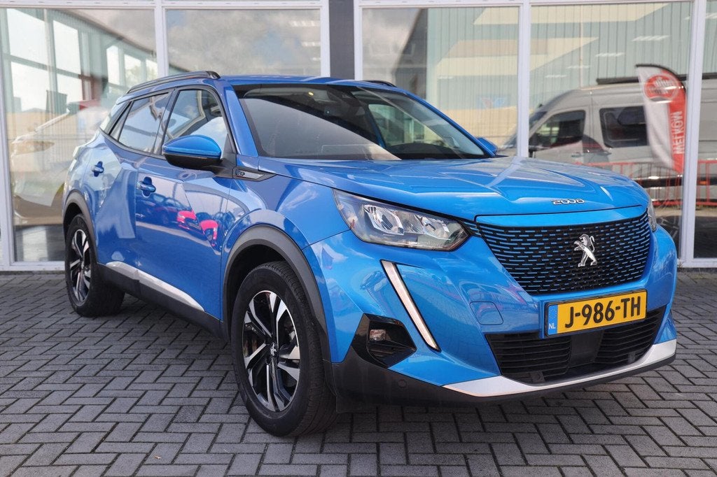 Peugeot e-2008 EV Allure 50 kWh|SOH 91%|Camera|ACC|Navi|Carp, Auto's, Peugeot, 330 km, 136 pk, Gebruikt, Blauw