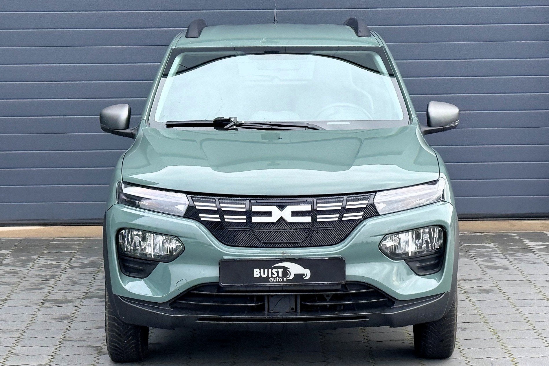 Dacia Spring Expression 27 kWh LEER CAMERA NAVI CARPLAY, Auto's, Dealer onderhouden, Gebruikt, Met garantie (alle), Parkeersensor