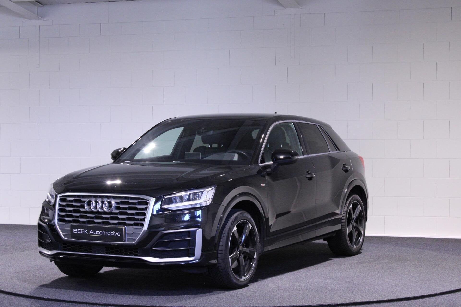 Audi Q2 1.4 TFSI CoD Sport Pro Line S | PDC | Trekhaak, Auto's, Gebruikt, 4 cilinders, Leder en Stof, Zwart