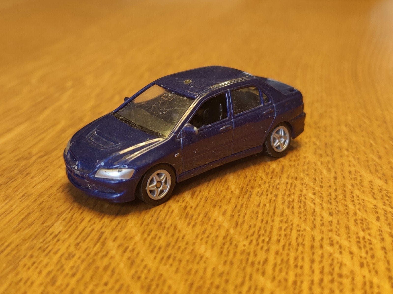 Welly Mitsubishi Lancer Evo VIII BLAUW, Ophalen of Verzenden, Zo goed als nieuw, Auto