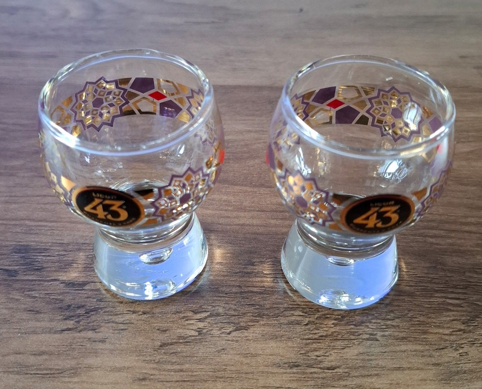 Set van 2 Licor 43 gekleurde borrelglaasjes, Glas of Glazen, Ophalen of Verzenden, Overige stijlen, Glas