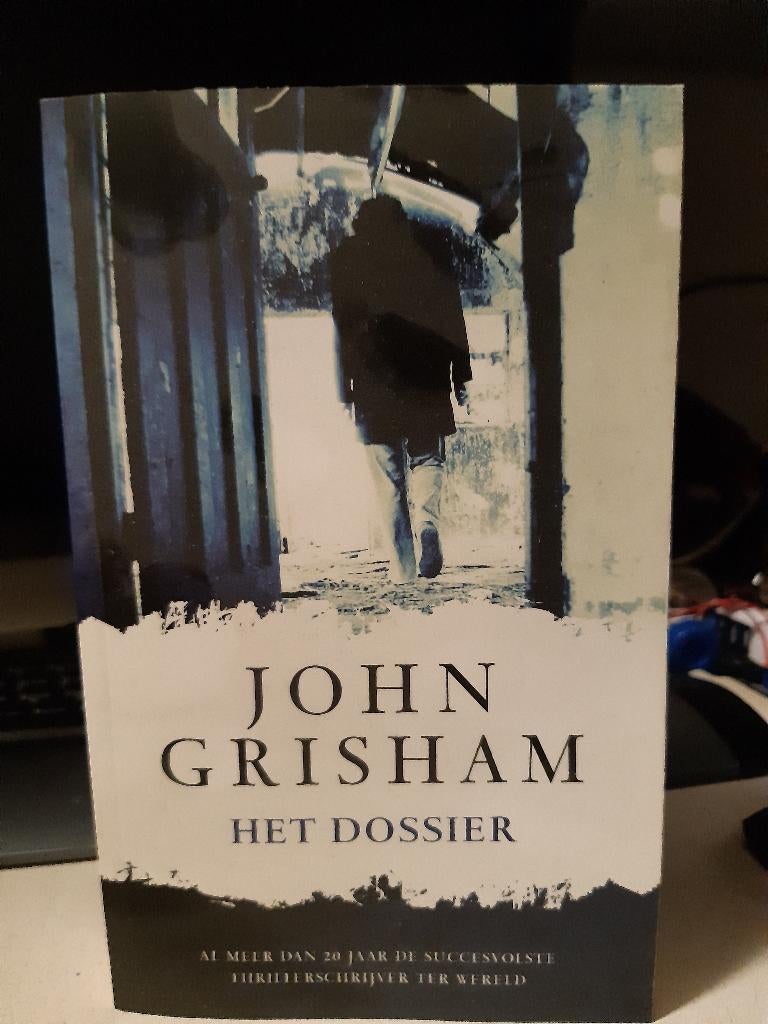 John Grisham-Het dossier (Z192-14), Ophalen of Verzenden, Zo goed als nieuw