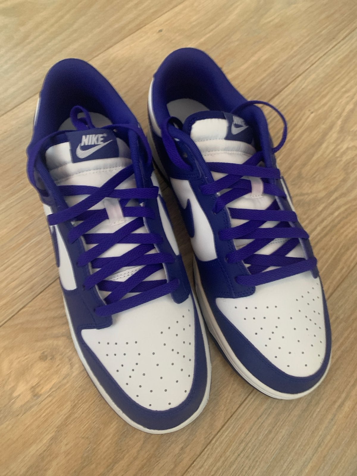 NIEUWE Nike Dunk Low Retro White/Concord-University Red, Kleding | Heren, Ophalen of Verzenden, Nieuw, Blauw, Sneakers of Gympen