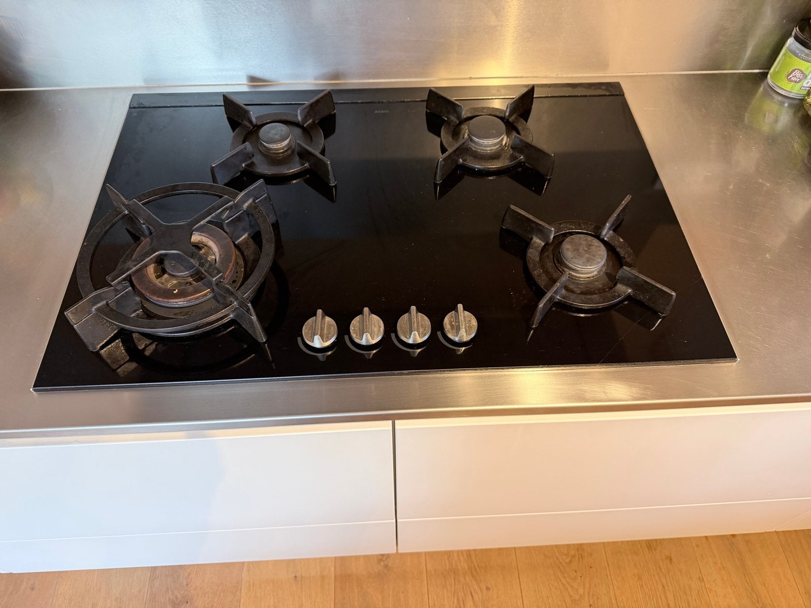 Zwart glazen ATAG gaskookplaat met 4 branders, Ophalen, Gebruikt, 4 kookzones, Inbouw