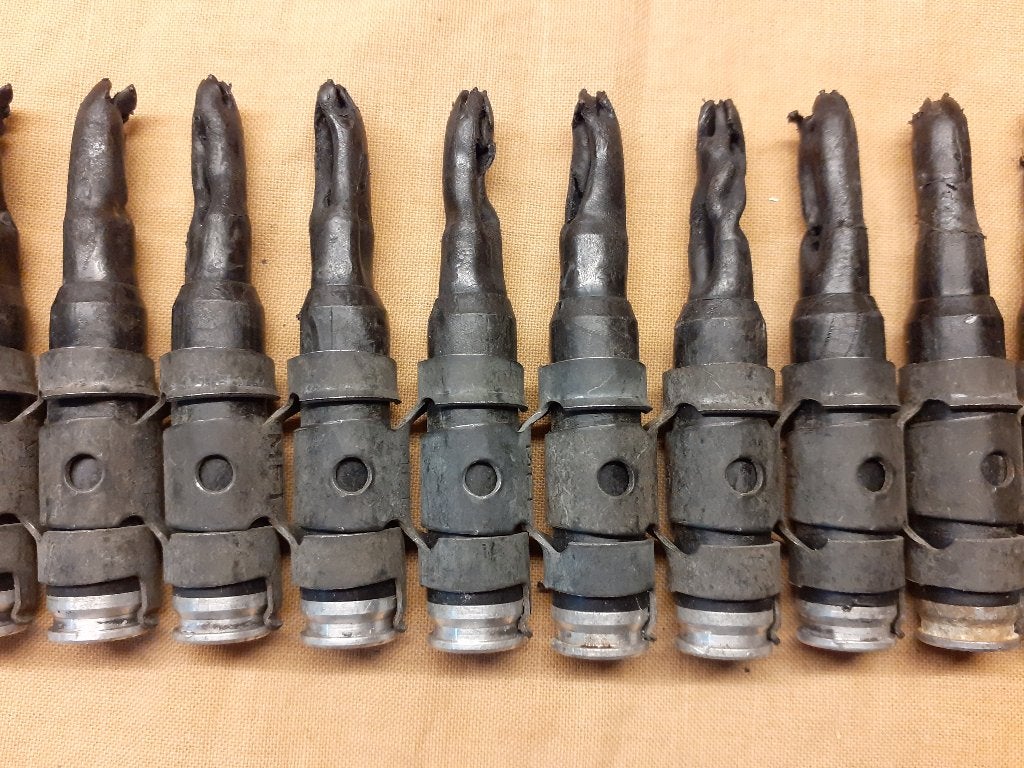 Hulzenband 7,62 MAG zwart, onklaar, Ophalen of Verzenden, Landmacht, Nederland, Hulzen of Bodemvondsten