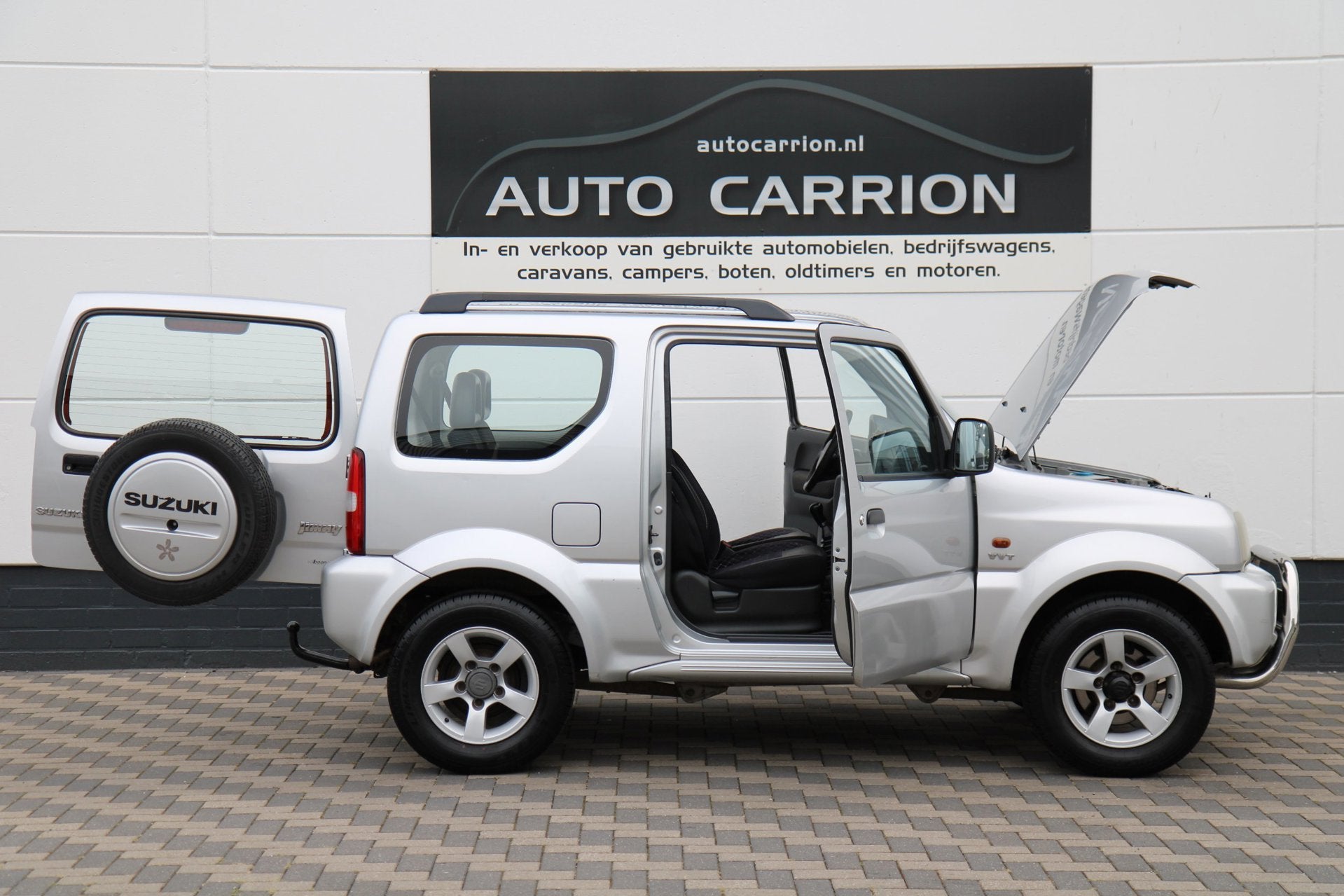 Suzuki Jimny 1.3 JLX 4WD Airco Trekhaak Carplay NAP !, 86 pk, Zwart, 4 stoelen, Bedrijf