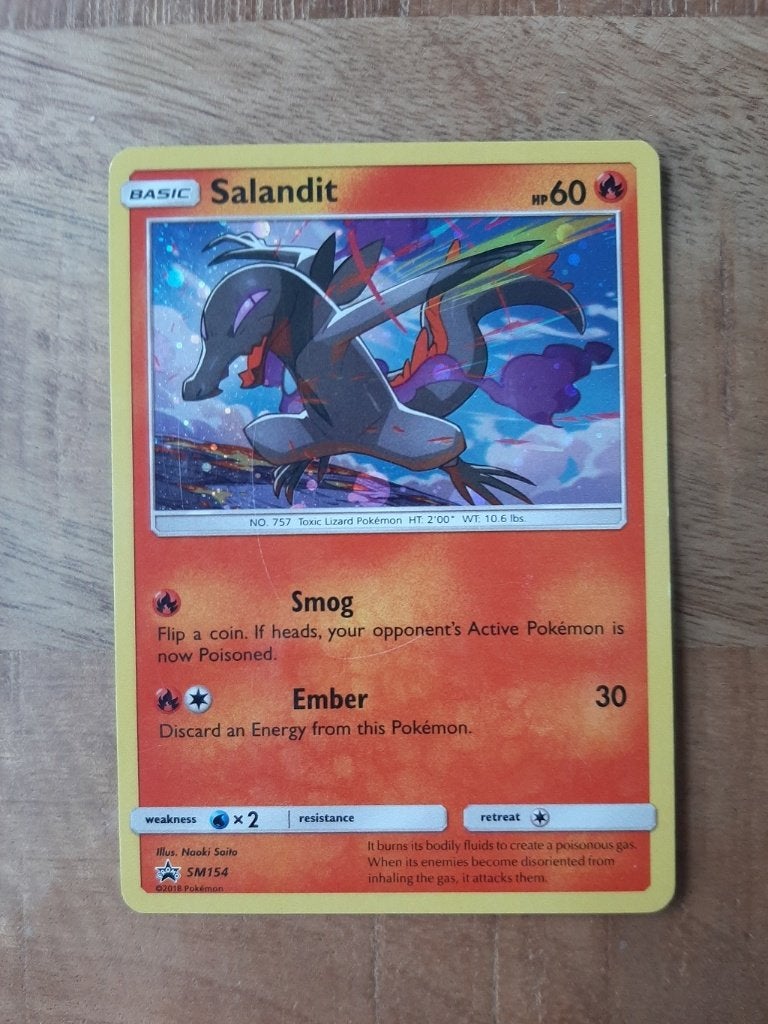 Salandit #SM154, Cosmos Holo, Pokemon Black Star Promo, Ophalen of Verzenden, Zo goed als nieuw, Losse kaart