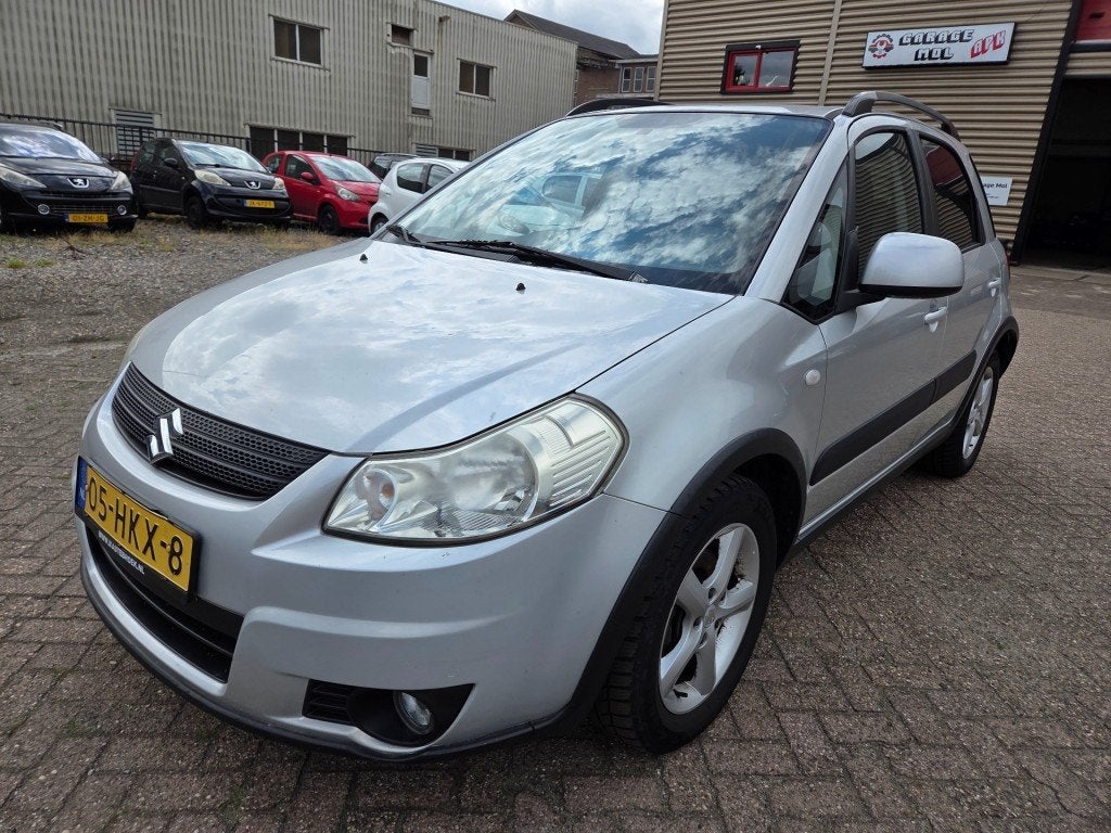 Suzuki SX4 1.6 Shogun Airco Trekhaak Elektrische ramen, Auto's, 15 km/l, Gebruikt, 4 cilinders, Elektrische ramen