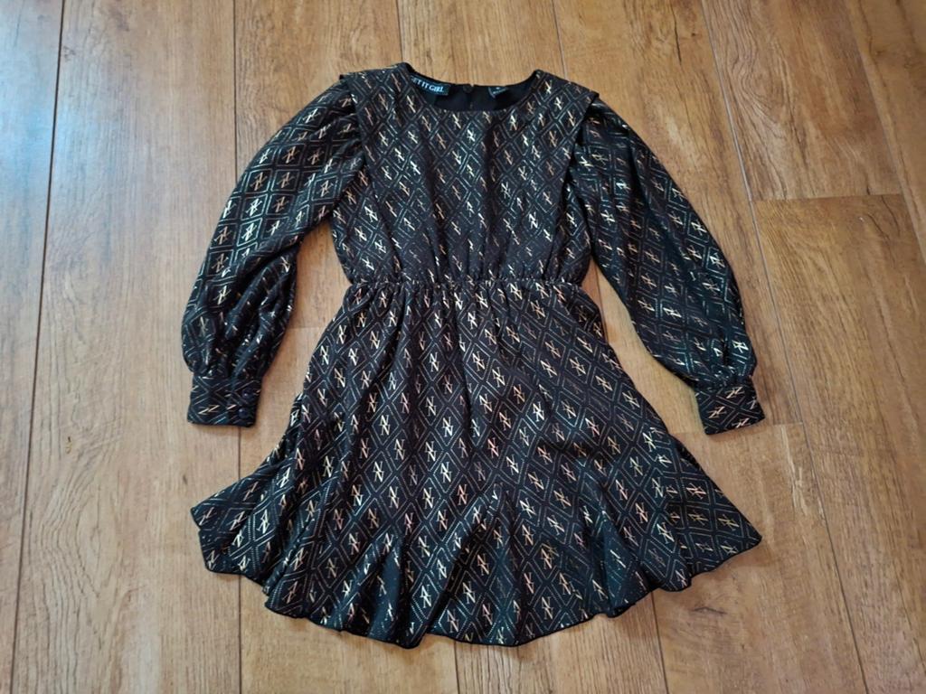 NIK&NIK jurkje zwart goud maat 116, Kinderen en Baby's, Kinderkleding | Maat 116, Meisje, NIK&NIK, Ophalen of Verzenden, Zo goed als nieuw