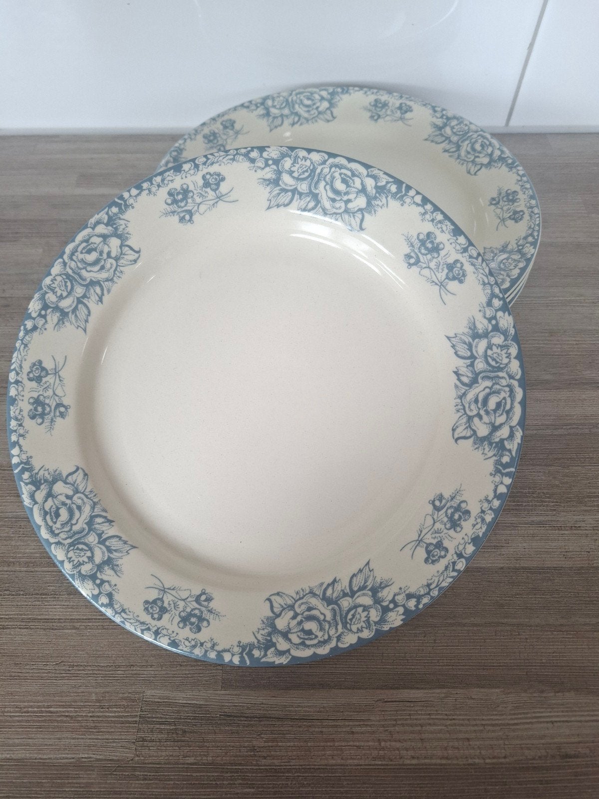Set van 4 borden met bloemmotief, Antiek en Kunst, Ophalen of Verzenden
