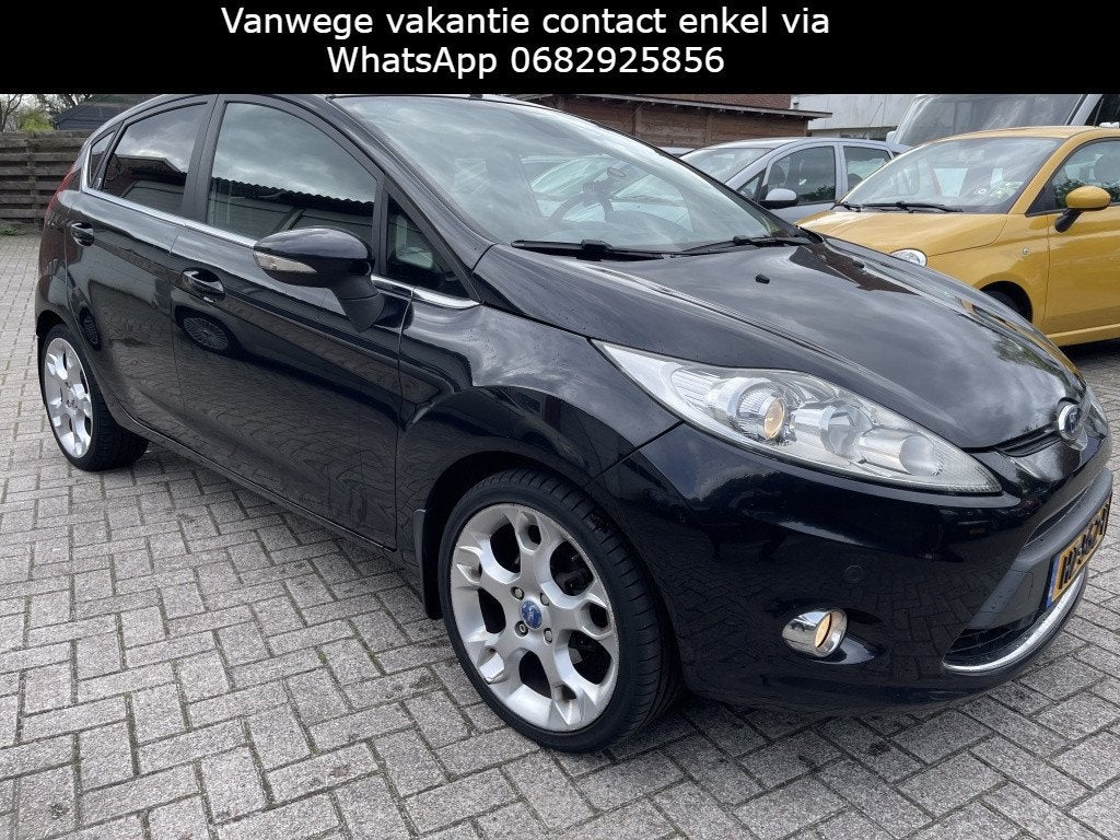 Ford Fiesta 1.6 Ghia Airco Navi 5 deurs APK: Nieuw bij aflev, Voorwielaandrijving, 1596 cc, Zwart, Bedrijf