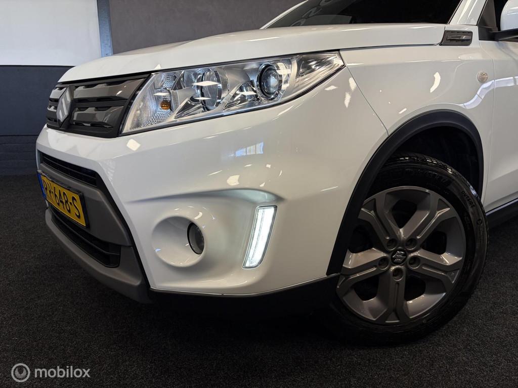 Suzuki Vitara 1.6 Exclusive 1E EIG / DEALER OH / CLIMA / CRU, Auto's, Suzuki, Voorwielaandrijving, Stof, 4 cilinders, 400 kg