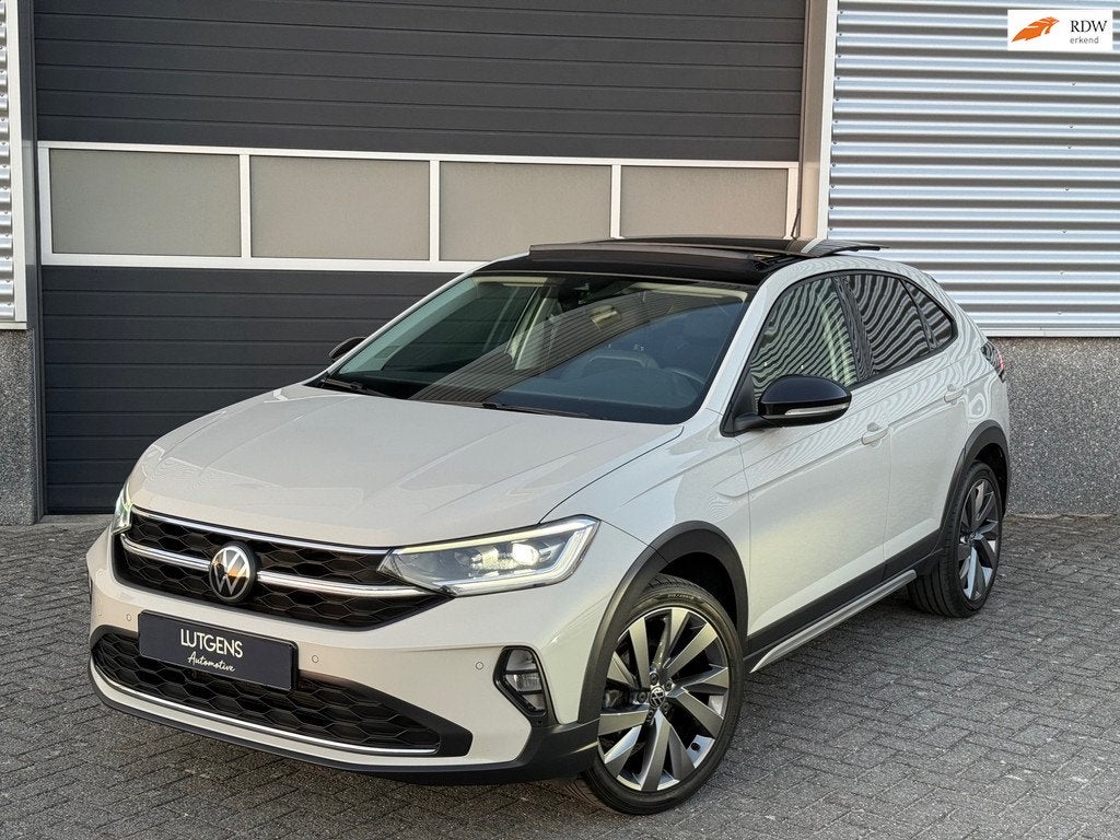 Volkswagen Taigo 1.0 TSI Pano IQ Leder Camera 18 Inch, Auto's, Volkswagen, Voorwielaandrijving, Gebruikt, Zwart, Origineel Nederlands