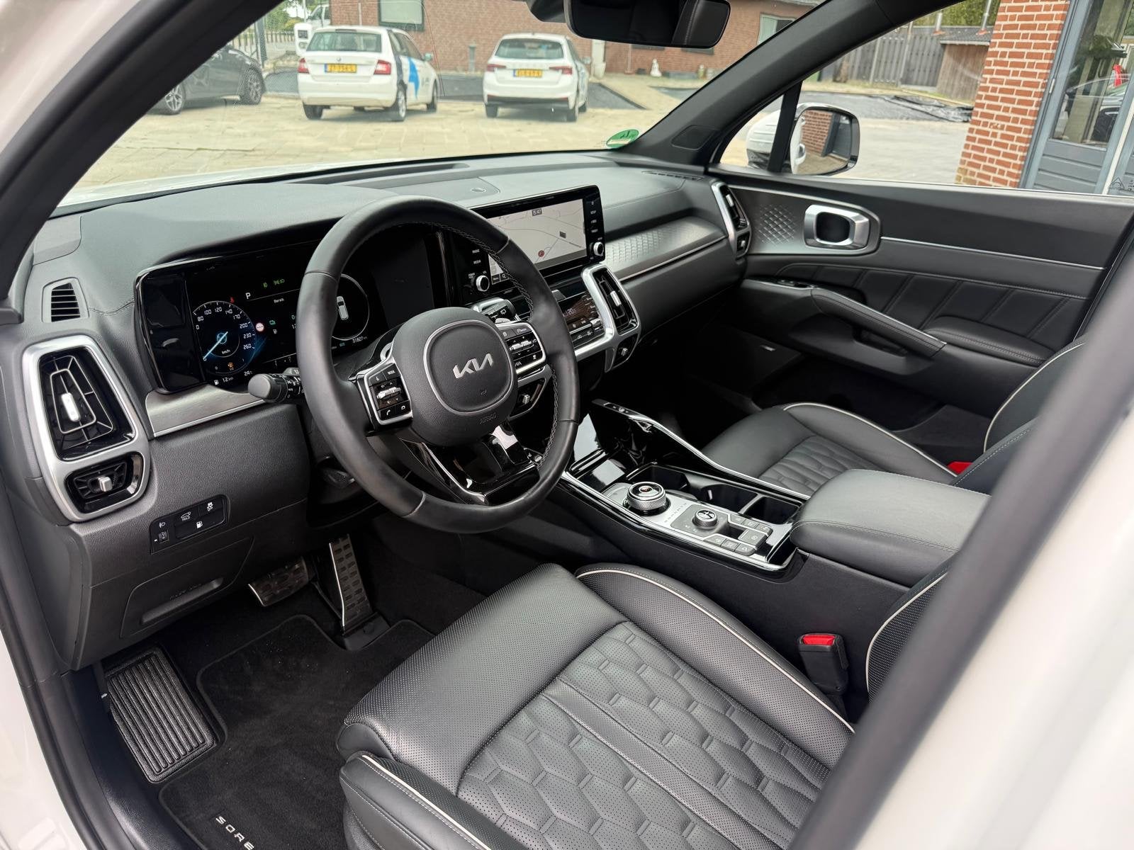 Kia Sorento 1.6 T-GDi 265PK Plug-in Hybrid 4WD ExecutiveLine, Auto's, Gebruikt, 4 cilinders, 7 stoelen, Wit