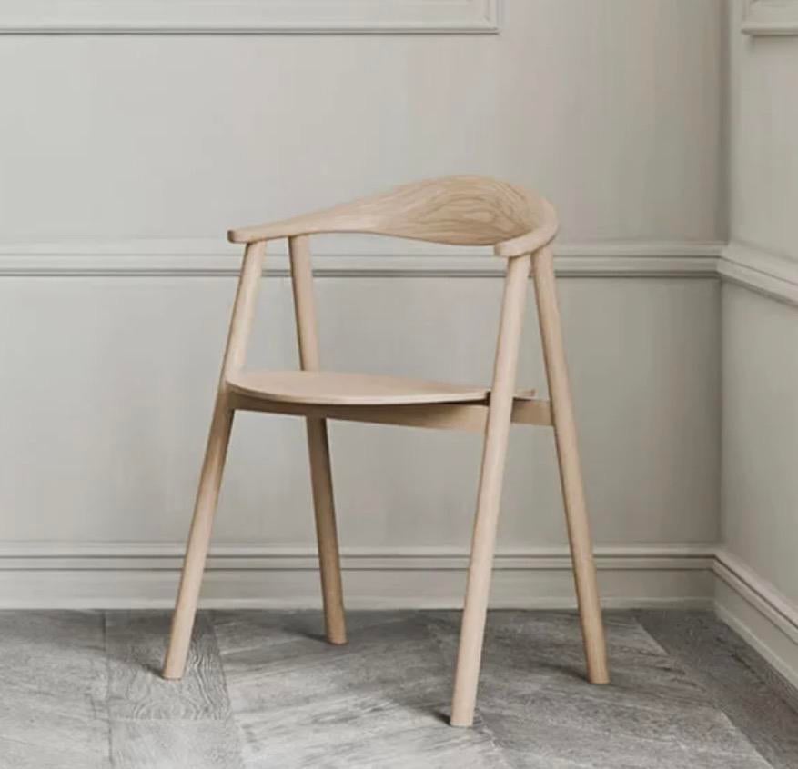 Op zoek naar 2 bolia swing eetstoelen witgepigmenteerd, Huis en Inrichting, Stoelen, Ophalen, Zo goed als nieuw