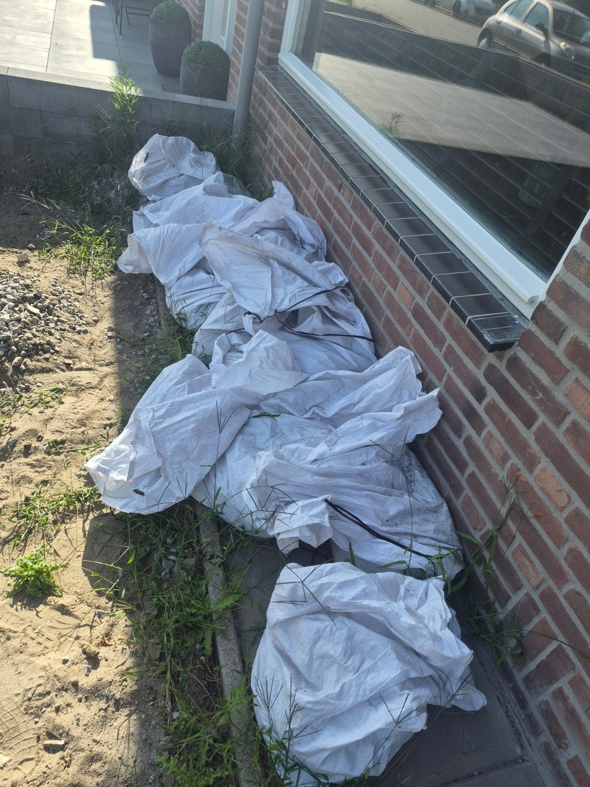 Grijs split in zakken - ideaal voor tuin of oprit, Tuin en Terras, Grind, Keien en Split, Ophalen, Overige materialen, Gebruikt