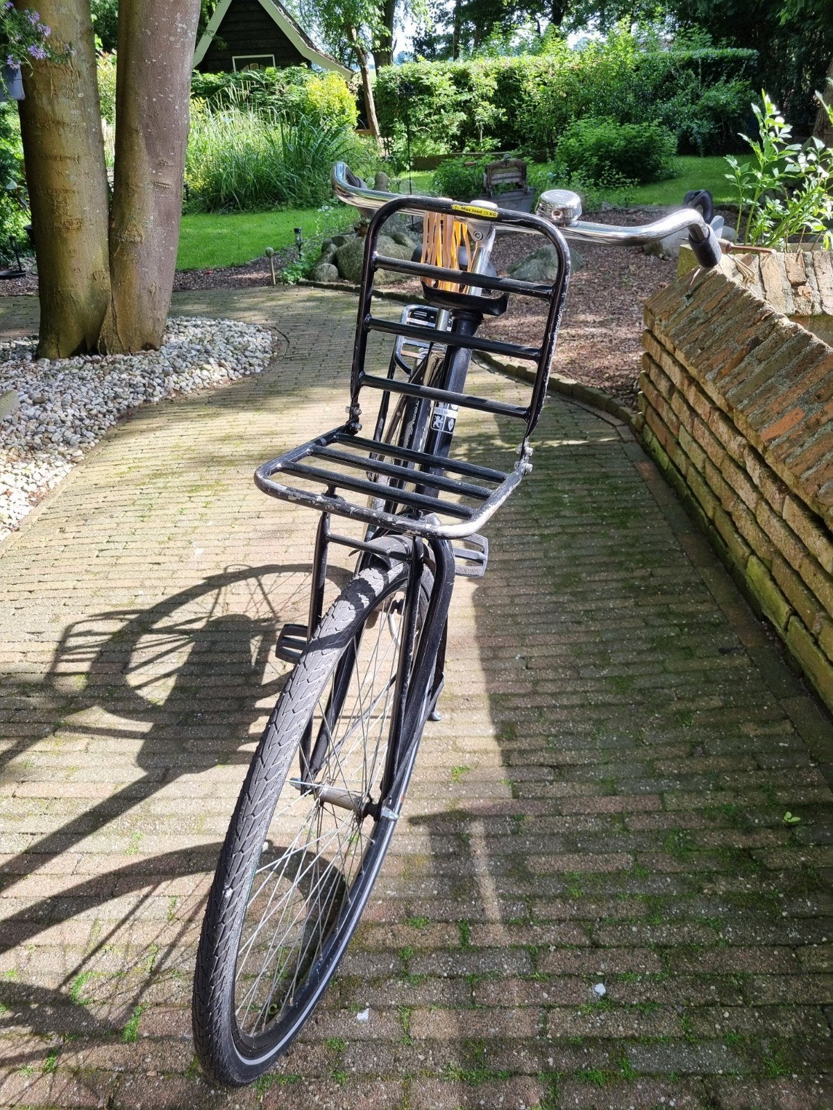 te koop zwarte Hollandia transportfiets, 56 cm of meer, Ophalen, Gebruikt