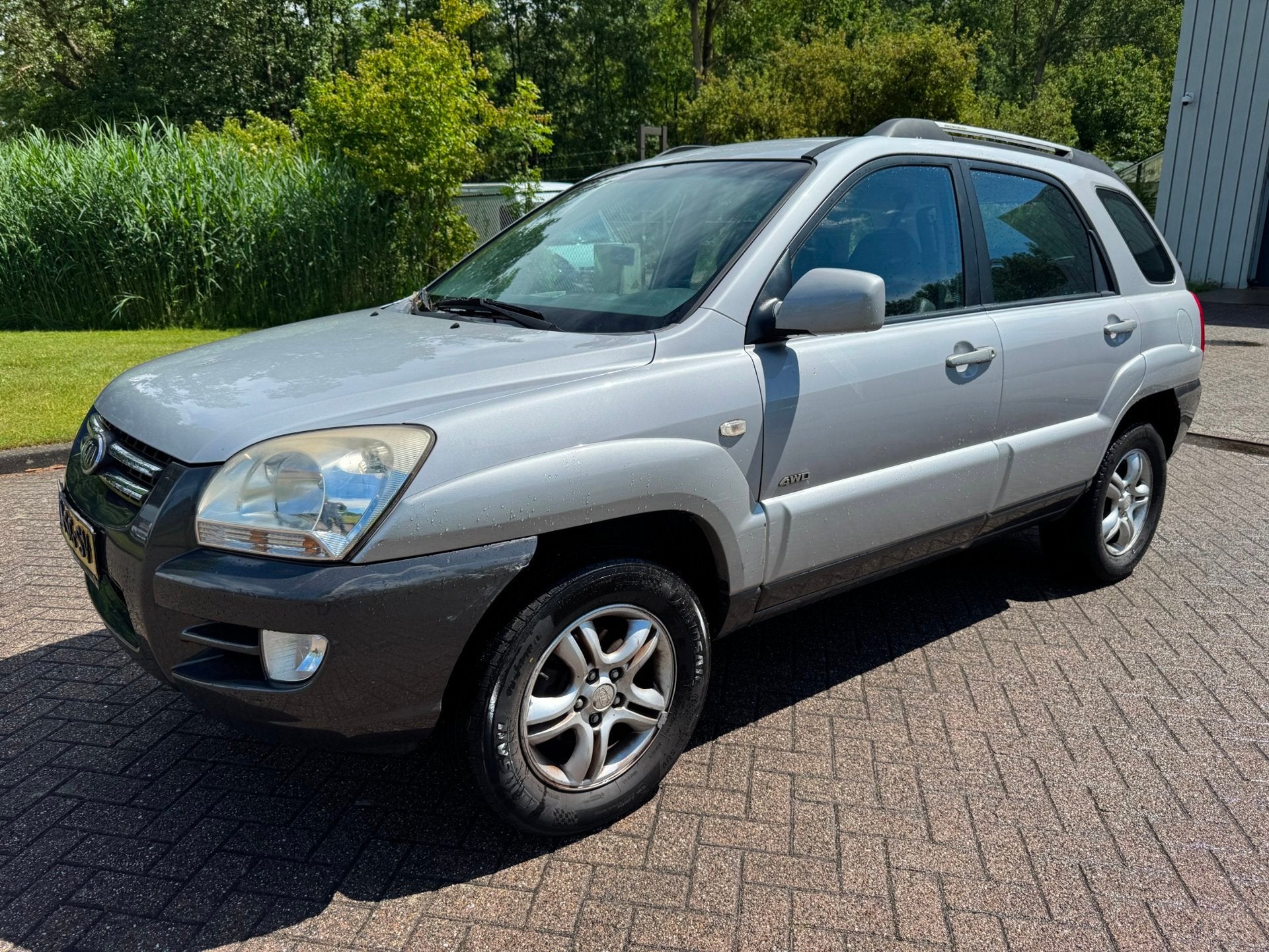 Kia Sportage 2.0 CVVT Comfort AIRCO PARKEERSENSOR ACHTER NIE, Auto's, Voorwielaandrijving, Gebruikt, Zwart, 4 cilinders