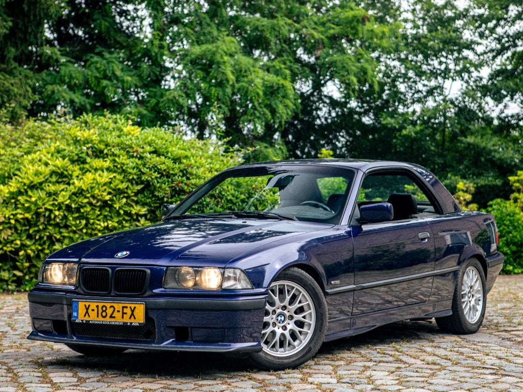 BMW 318I cabrio 1997 Montreal Blauw, Auto's, BMW, Bedrijf, Te koop, 3-Serie, ABS, Airbags, Airconditioning, Automatische klimaatregeling