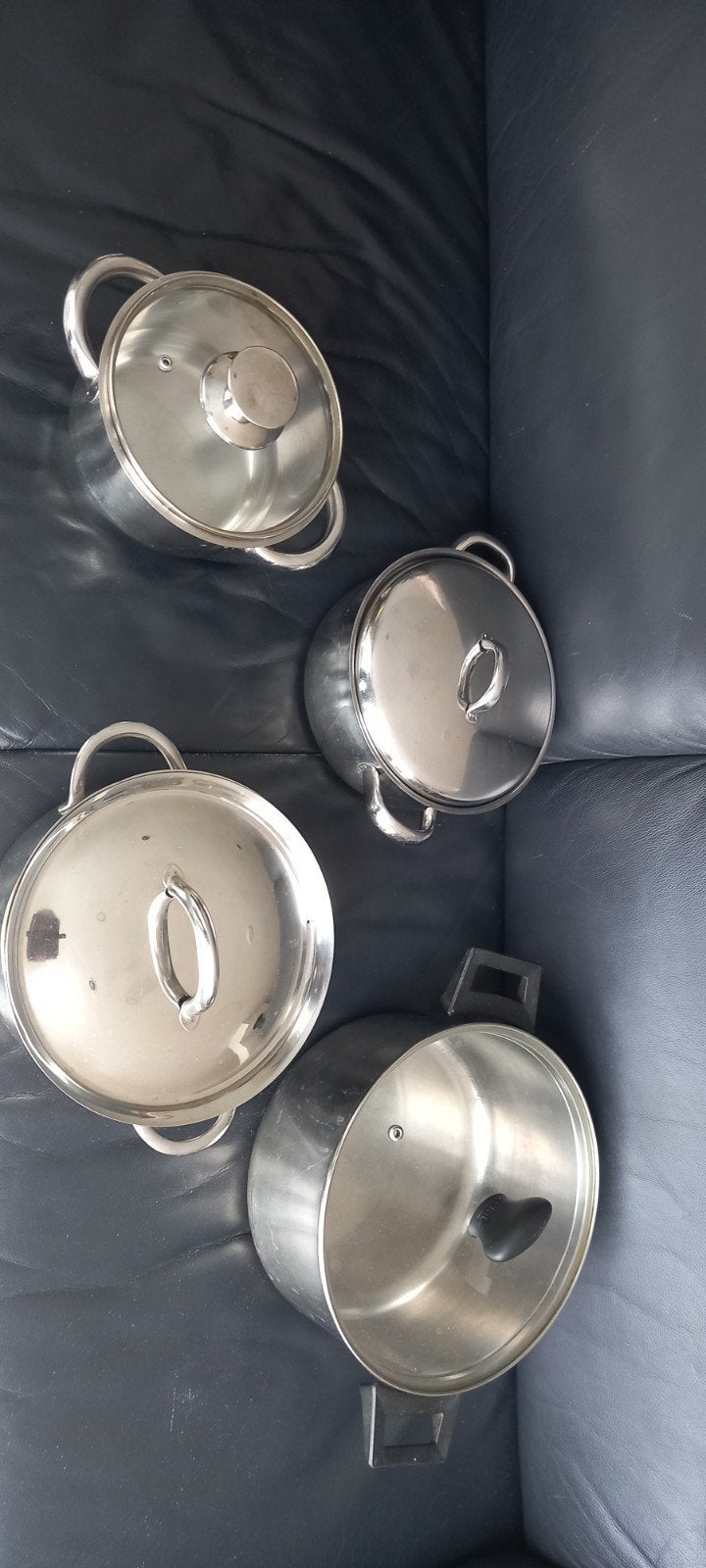 4  RVS kookpannen met deksels, Ophalen of Verzenden, Gebruikt, Rvs, Pannenset