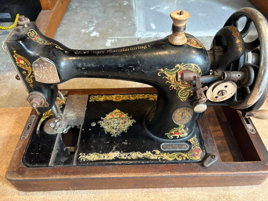 Antieke Singer Naaimachine, Ophalen