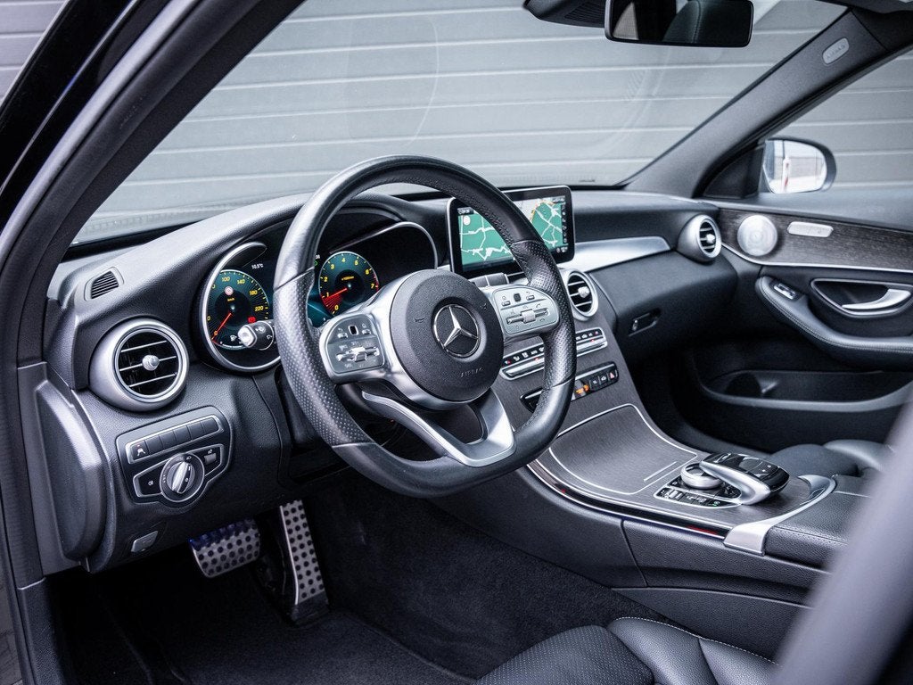 Mercedes-Benz C-klasse Estate 200 4MATIC AMG-Line l Pano l B, Auto's, Mercedes-Benz, 4 cilinders, Zwart, Vierwielaandrijving, 184 pk