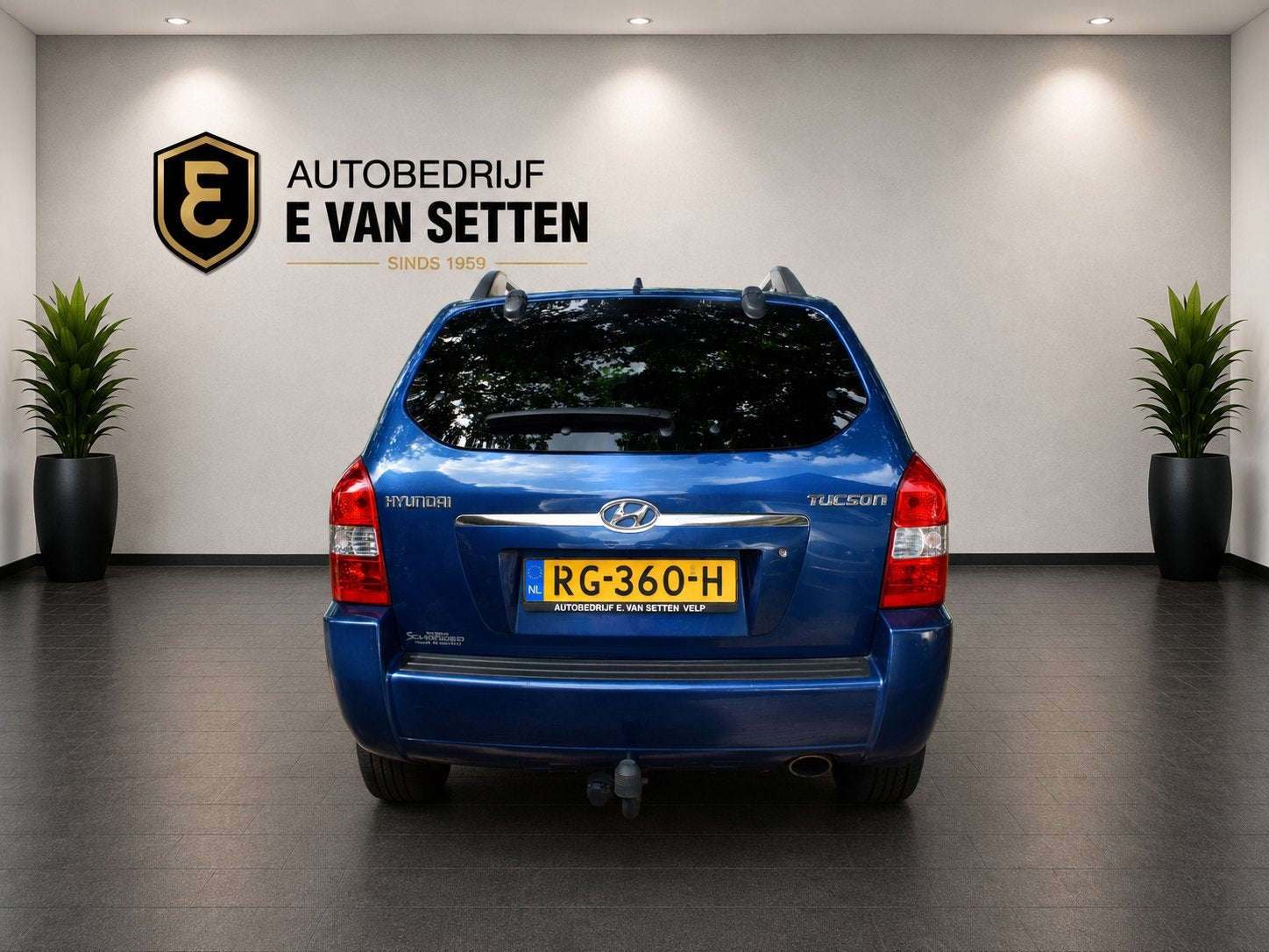 Hyundai Tucson 2.0i Active Leer/Airco/Trekhaak, Gebruikt, Zwart, 4 cilinders, Blauw