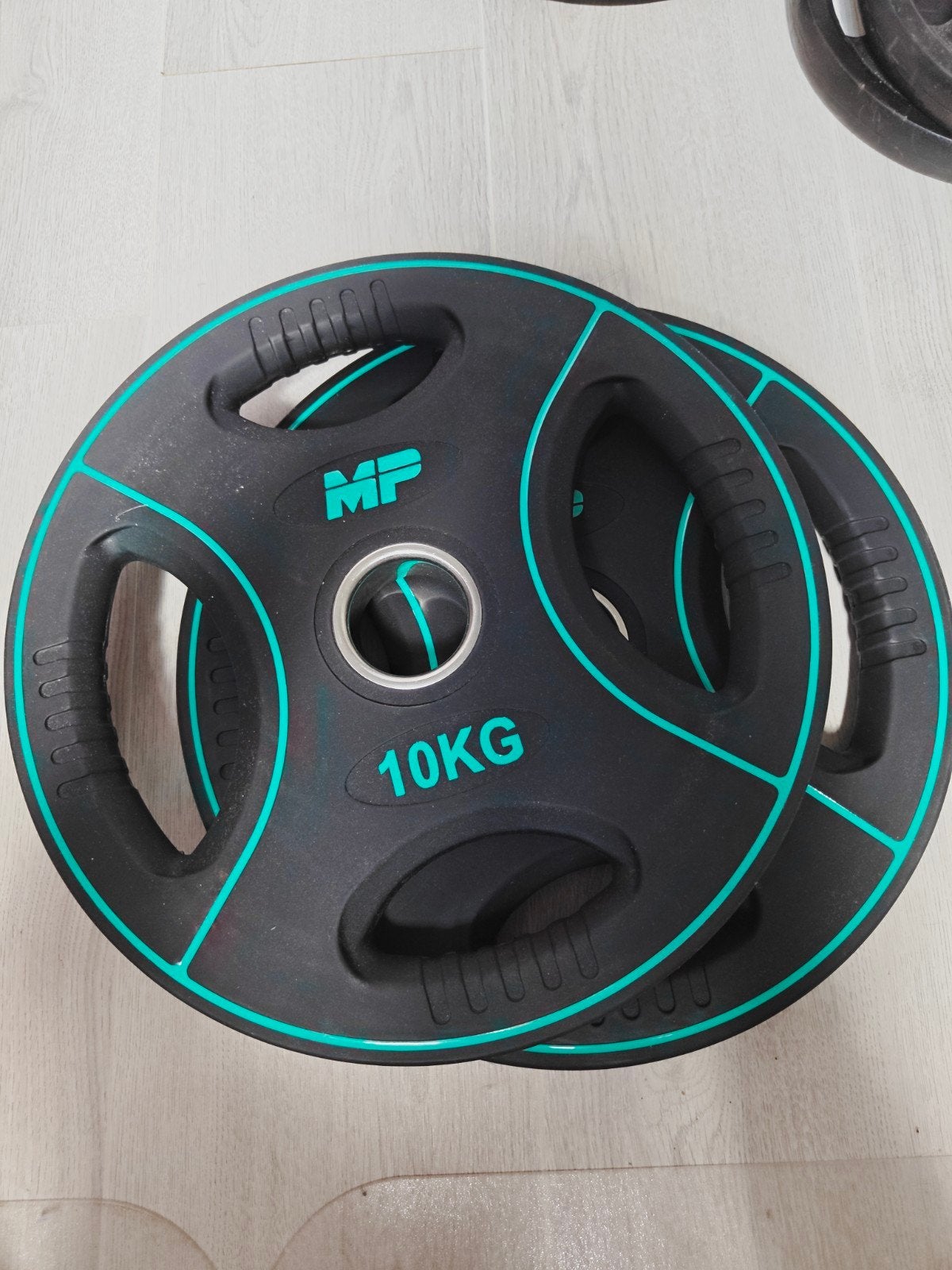 Muscle Power PU 2x10kg halterschijven, Sport en Fitness, Fitnessmaterialen, Ophalen, Zo goed als nieuw, Benen, Halterschijven