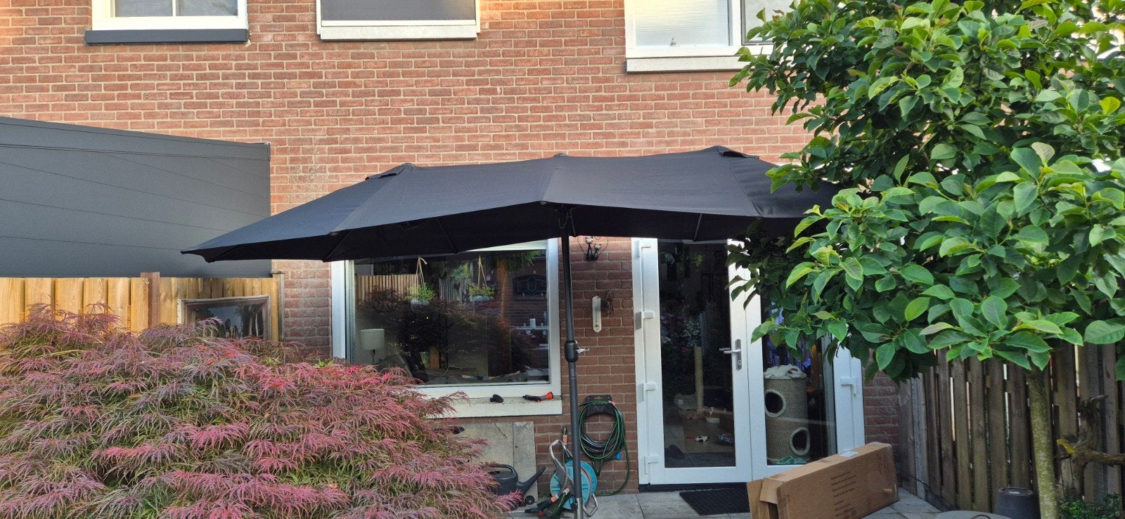 Dubbele parasol met hoes Nieuw in doos!, Tuin en Terras, Ophalen, Nieuw, Stokparasol