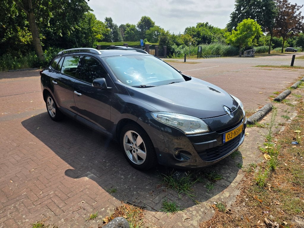 Renault Megane 1.4 16V TCE 96KW Estate 2010 Grijs, Auto's, Voorwielaandrijving, 4 cilinders, Origineel Nederlands, Stationwagon