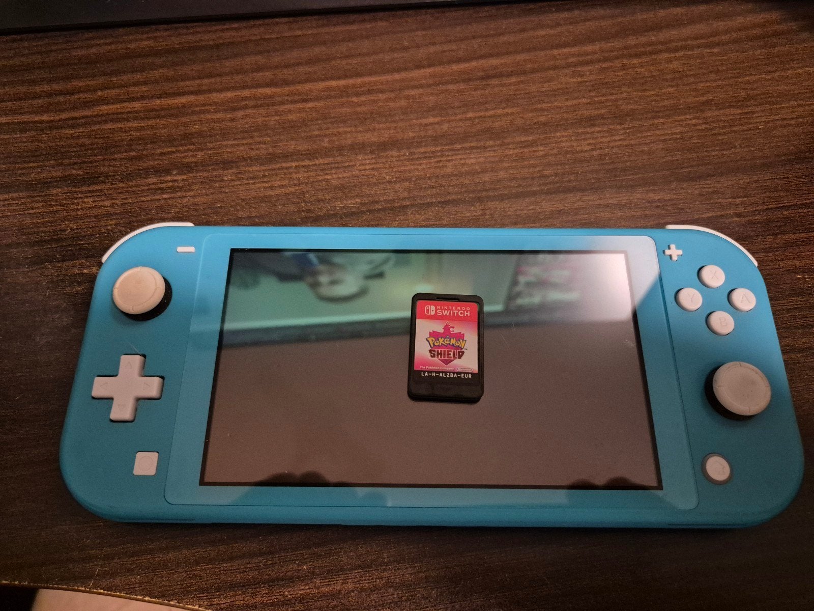 Nintendo Switch Lite Turquoise + Pokémon Shield, Spelcomputers en Games, Spelcomputers | Nintendo Switch Lite, Ophalen of Verzenden
