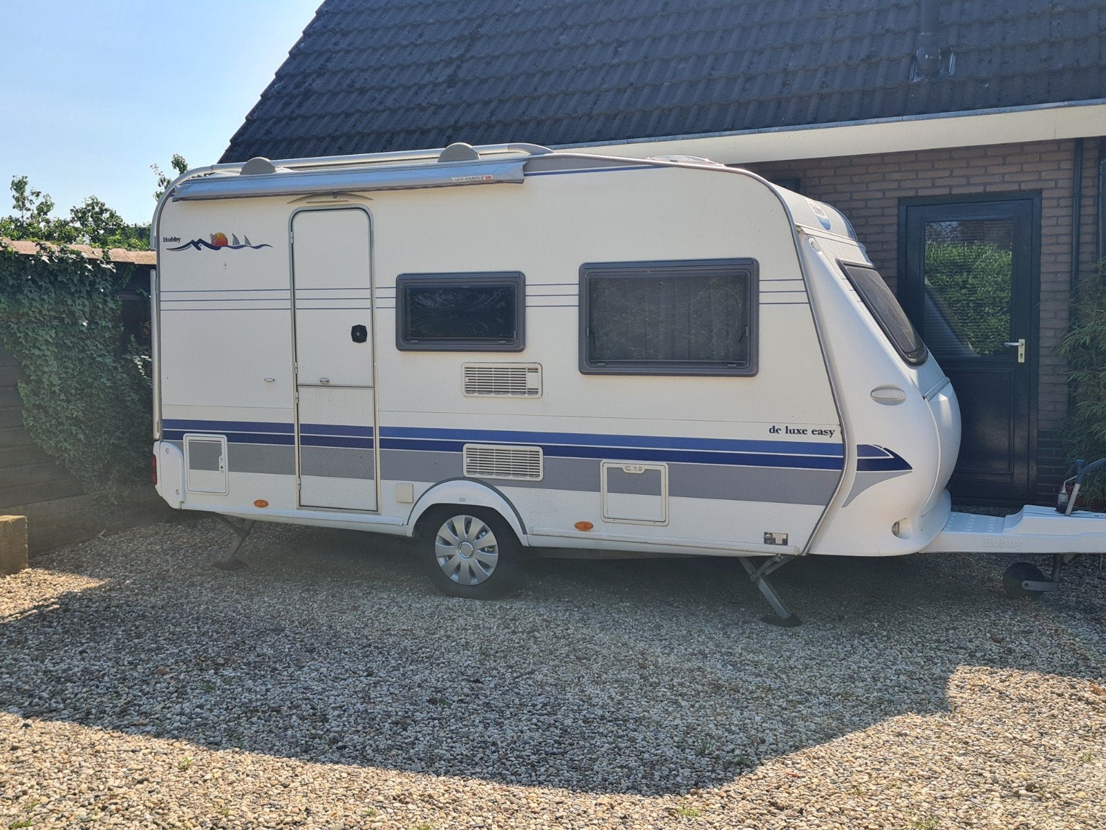 Nette 4-persoons Hobby 400 SF nieuwe voortent!, Hobby, Schokbreker, Treinzit, 750 - 1000 kg