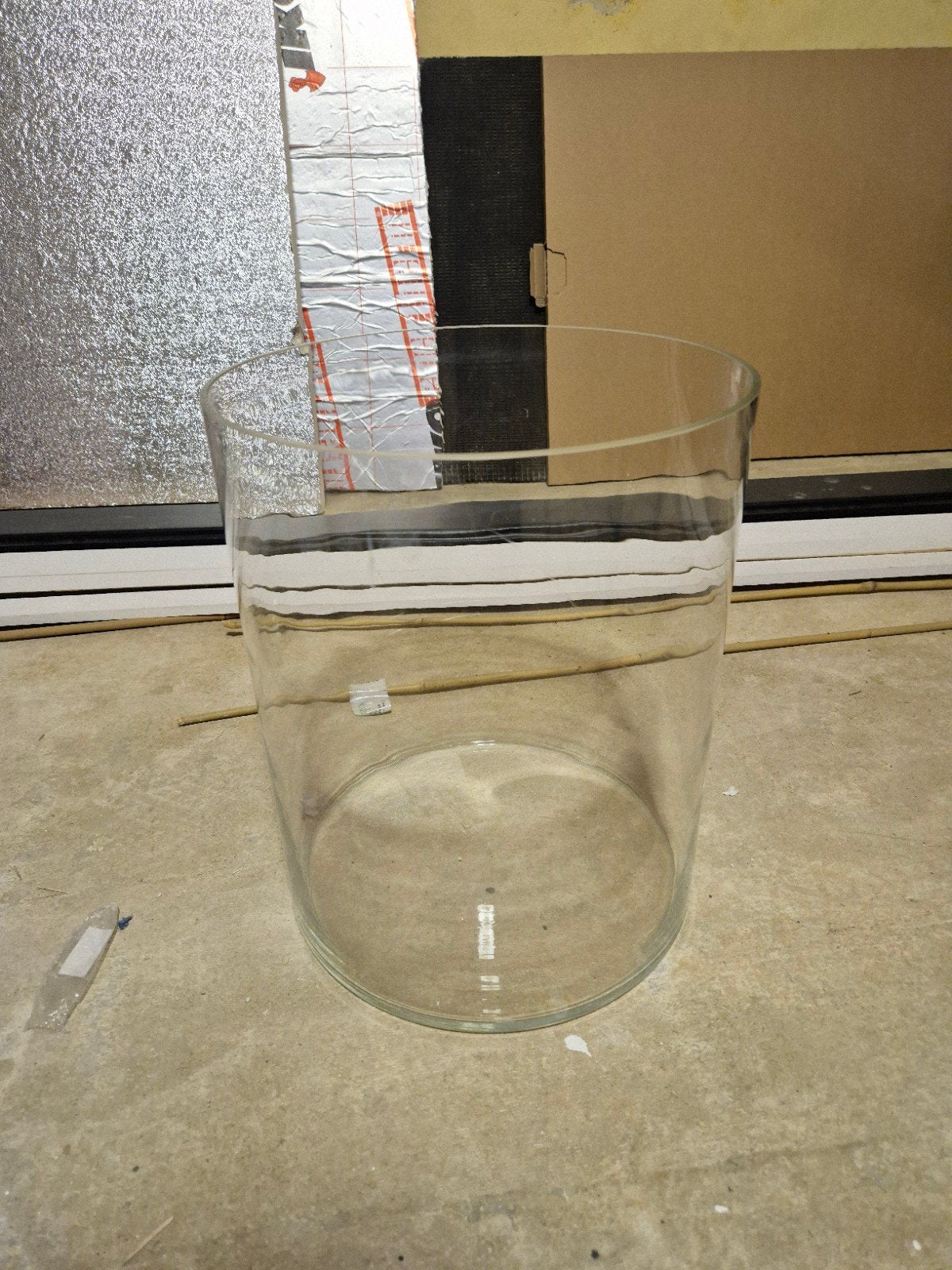 Grote glazen cilindervaas, Ophalen