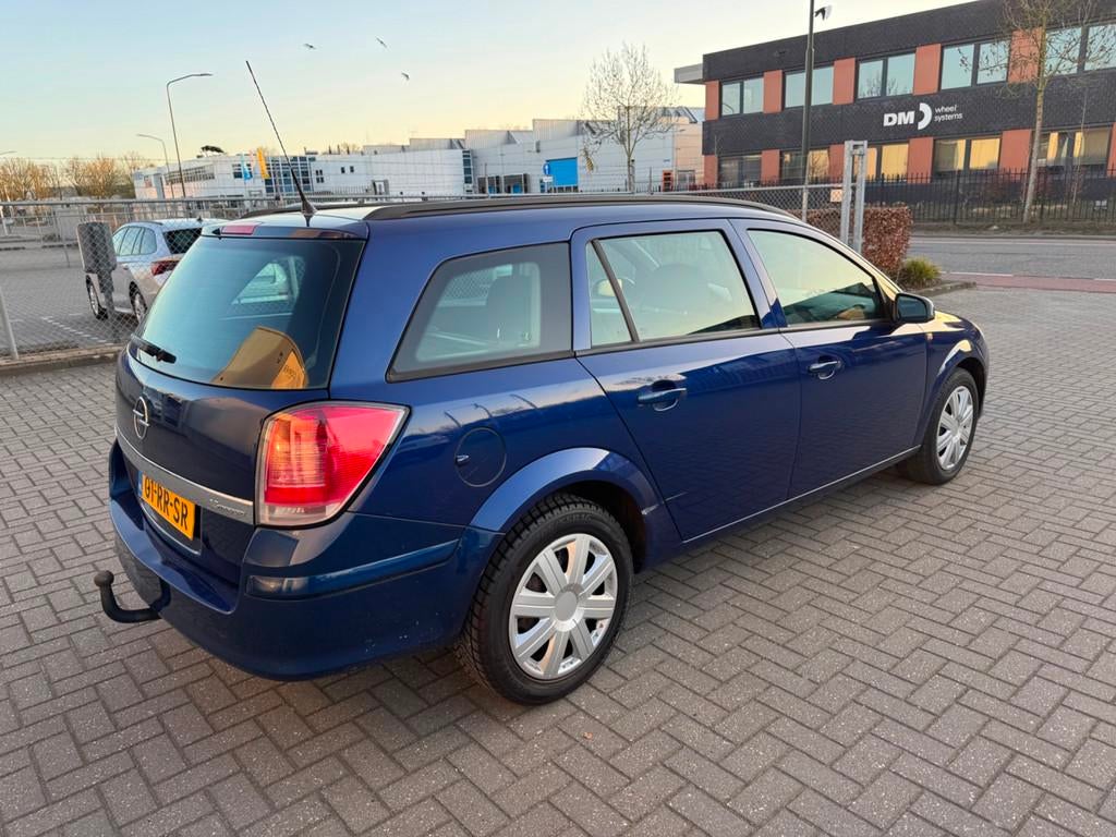 Opel Astra Wagon 1.6 Enjoy, Voorwielaandrijving, 15 km/l, Gebruikt, 4 cilinders