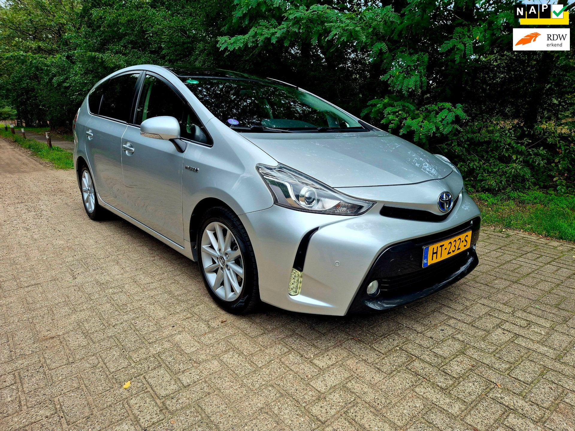 Toyota Prius Wagon 1.8 Lease 7 persoons trekhaak, Auto's, Dealer onderhouden, Gebruikt, 4 cilinders, 23 km/l